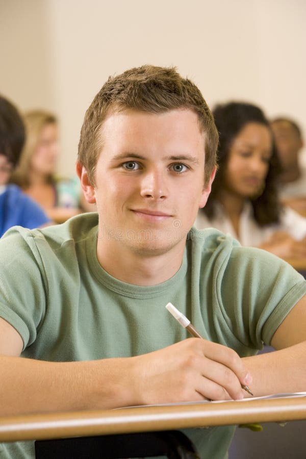 Male college student in a university lecture hall