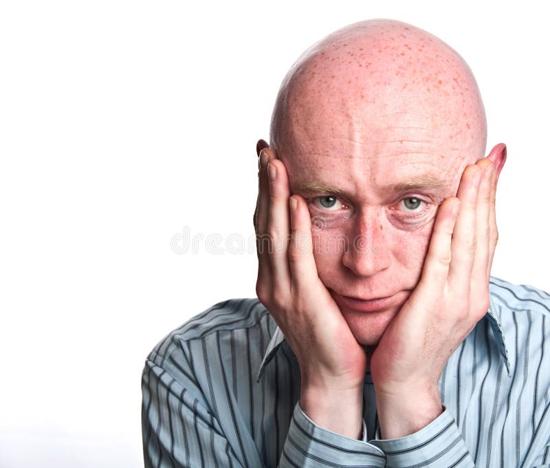 Male concern hands face on white back drop royalty free stock image