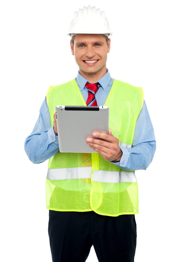 Male construction engineer using tablet pc royalty free stock photo
