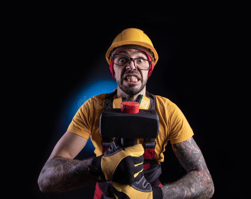 The Male Construction Worker with a Sledgehammer Stock Photo Image of helmet, gloves 175673894