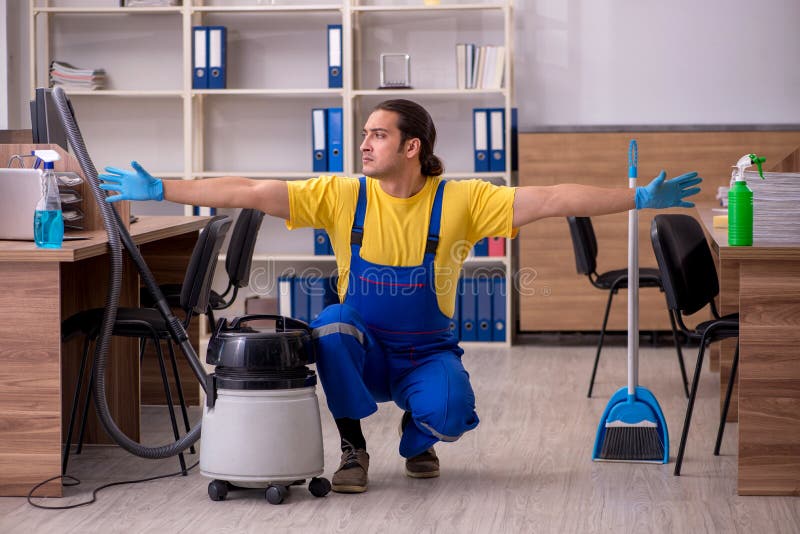 Young Male Contractor Cleaning the Office Stock Photo Image of