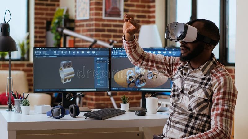 Male 3D engineer developing an industrial prototype with vr headset royalty free stock photos