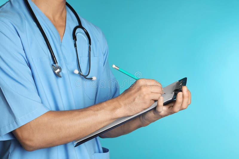 Male doctor with stethoscope and clipboard on color background, closeup.