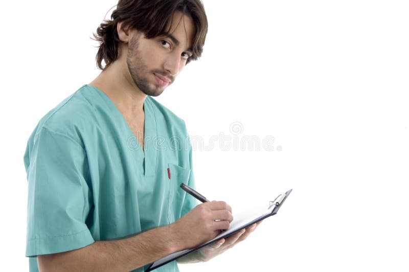 Male doctor writing prescription