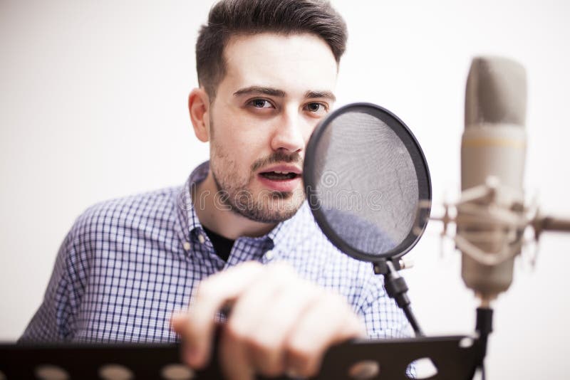 Male dub actor in dubbing room