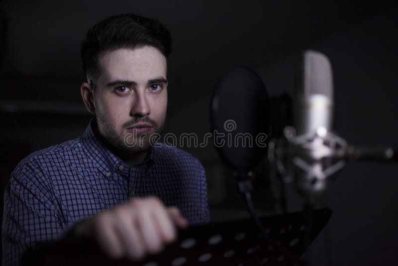 Male dub actor in dubbing room