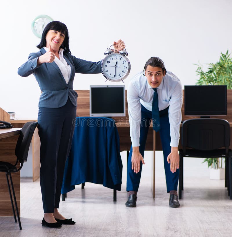 Male Employee Doing Sport Exercises in the Office Stock Photo Image