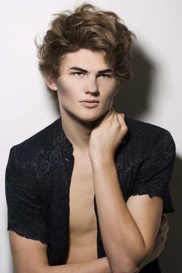 Male fashion model with stylish makeup