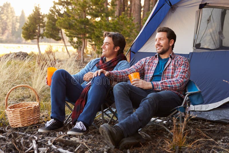 Couple Camping Next To Stream Stock Photo - Image of horizontal, image ...