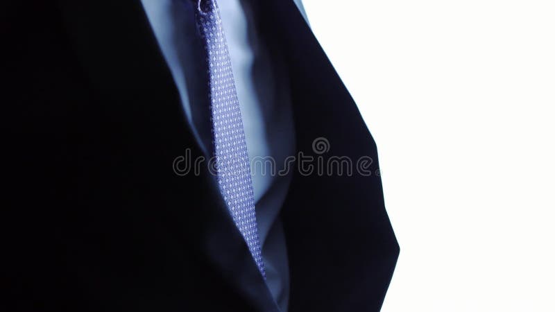 Male groom wears a necktie accessory jacket