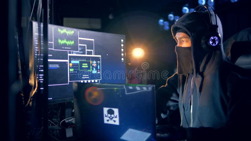 A female hacker in action using the co, Stock Video