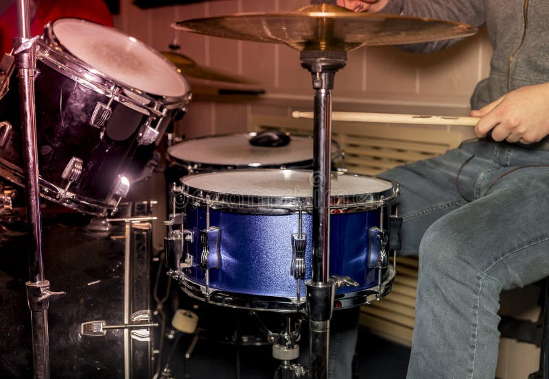 Male Hand and Drums with Metal Plates Stock Photo Image of light
