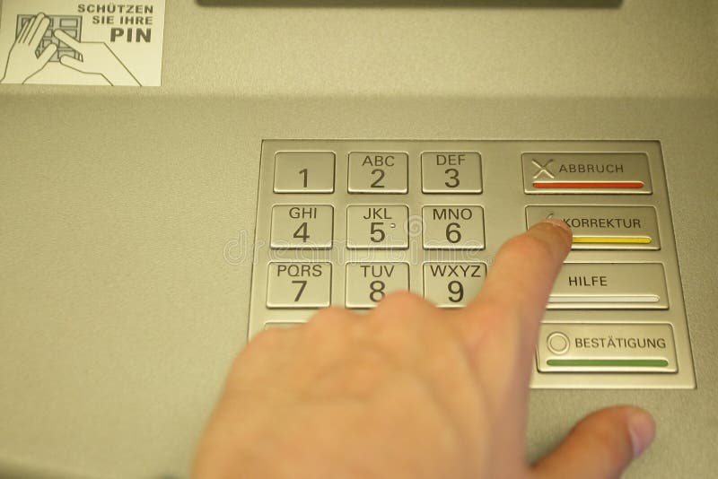 Male hand enters code at cash dispenser. Money payment, finance transaction and economy concept royalty free stock images Male hand enters code at cash dispenser. Money payment, finance transaction and economy concept royalty free stock images