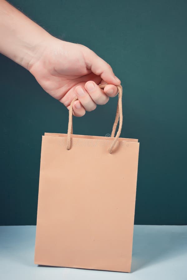 Male Hand Holding Brown Paper Bag with Handles Stock Photo Image of