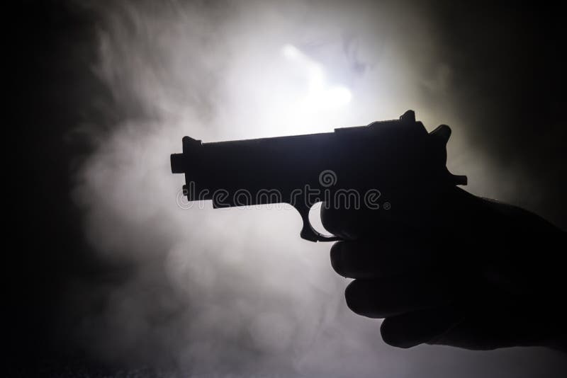 Male Hand Holding Gun on Black Background with Smoke Toned Back Lights  Stock Image - Image of handgun, colt: 148693583