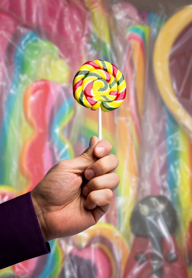 Male hand with a lollipop stock image. Image of lolly - 69262257