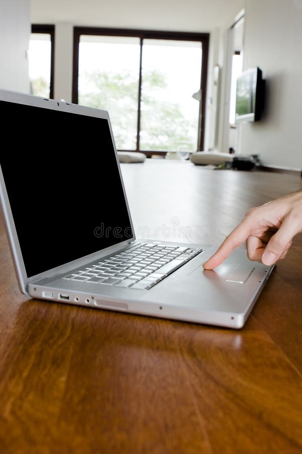 Male Hand and Modern Laptop stock photography