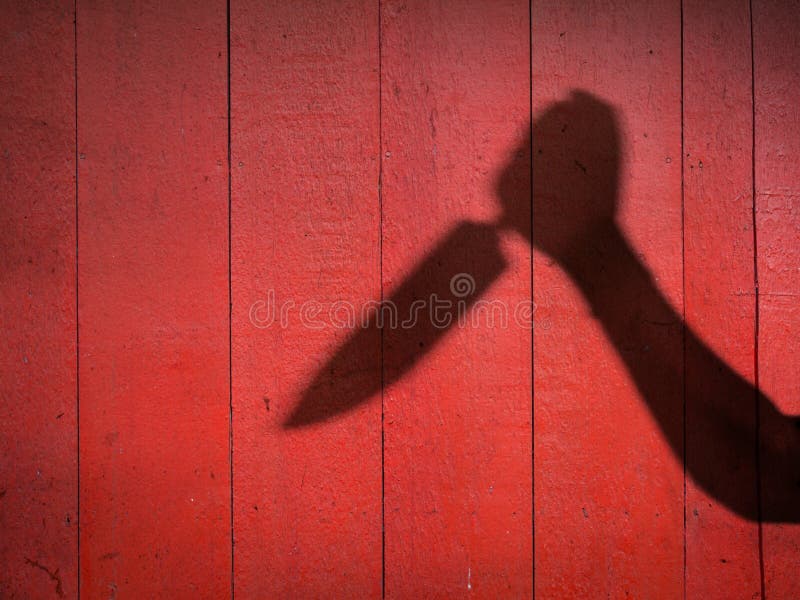 Male Hand Shadow with Kitchen Knife royalty free stock image Male Hand Shadow with Kitchen Knife royalty free stock image
