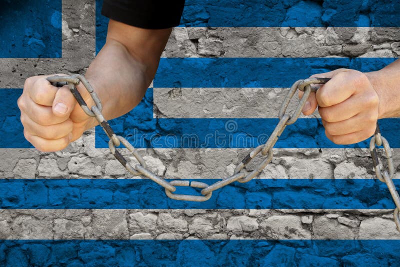 Male hands break the iron chain, a symbol of bondage,protest against the background of the national flag of Greece, the concept of. Political repression, arrest