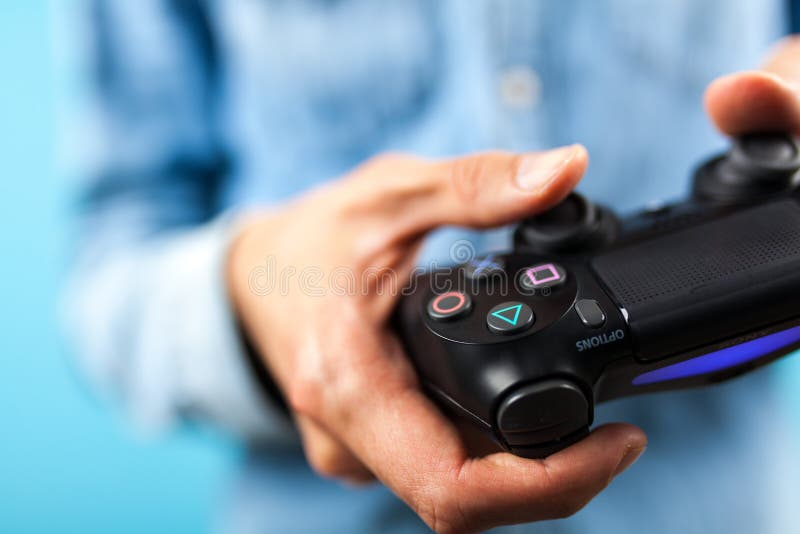 Male Hands Holding a PS4 Controller Editorial Photography Image of