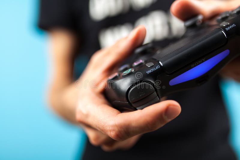Male Hands Holding a PS4 Controller Editorial Photography Image of