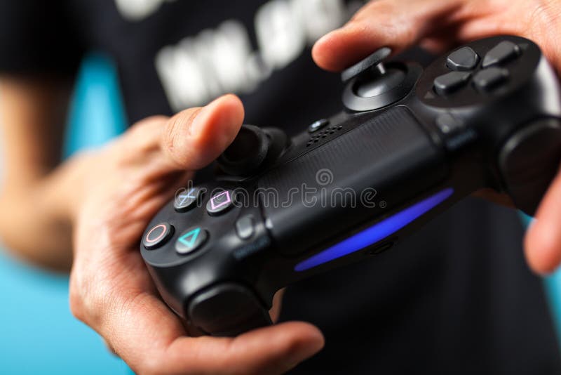 Male Hands Holding a PS4 Controller Editorial Stock Photo Image of