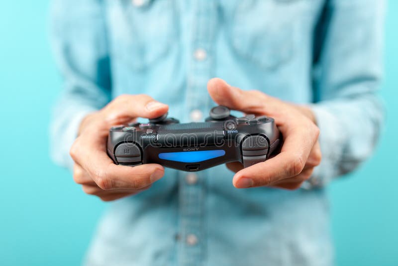 Male Hands Holding a PS4 Controller Editorial Stock Photo Image of