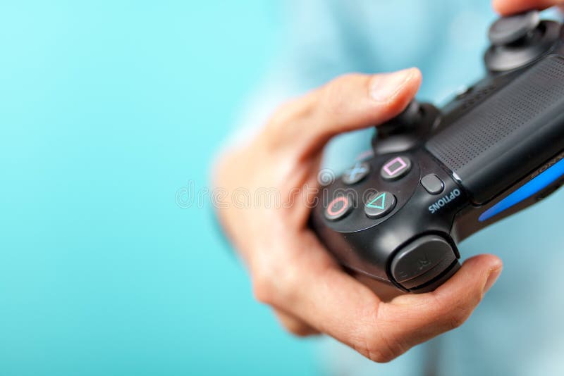 Male Hands Holding a PS4 Controller Editorial Stock Photo Image of