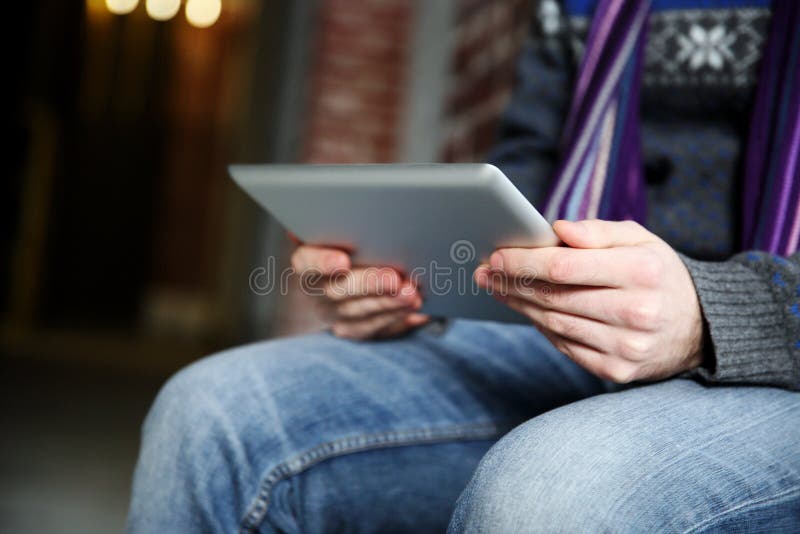 Male hands holding tablet computer royalty free stock photos