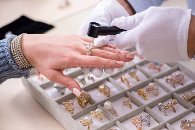 Male Jeweler and Female Client at Store Stock Image Image of