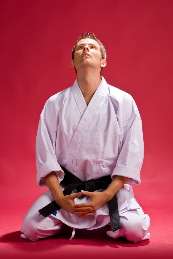 Male Karate Expert Kneeling Stock Photo Image of calmly, kimono 5928980