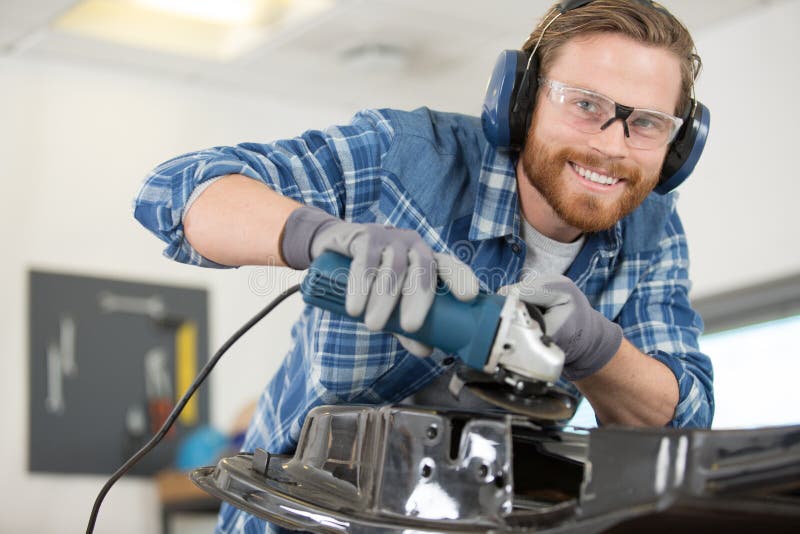Male Mechanic Using Angle Grinder Stock Photo Image of grinder