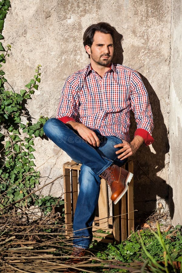 Male Model Leaning Against Wall Stock Image - Image of suave, male ...