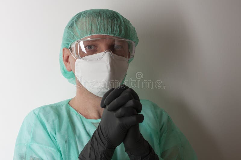 Male Nurse, with Plastic Protective Eyeglasses and Respirator Ffp2, Cap