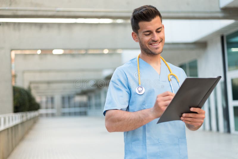 Male Nurse Vet with Stethoscope and Tablet Stock Photo Image of nurse