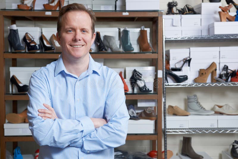 Male Owner Of Shoe Store royalty free stock image