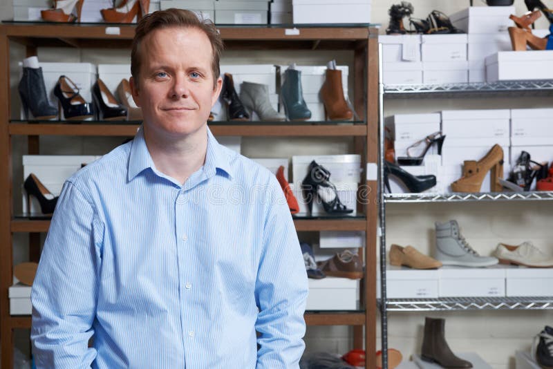 Male Owner Of Shoe Store royalty free stock image