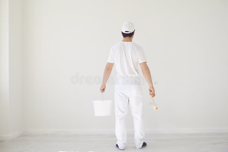 House Painter in White Uniform on a White Background for Painting in