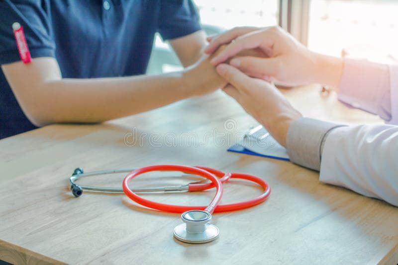The Male physician, breast cancer counselor, regular medication, healthy exercise,Medical, Healthy Concept stock image The Male physician, breast cancer counselor, regular medication, healthy exercise,Medical, Healthy Concept stock image