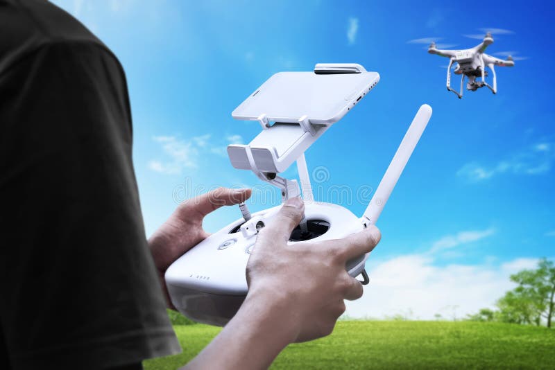 Male pilot controlling drone royalty free stock image Male pilot controlling drone royalty free stock image