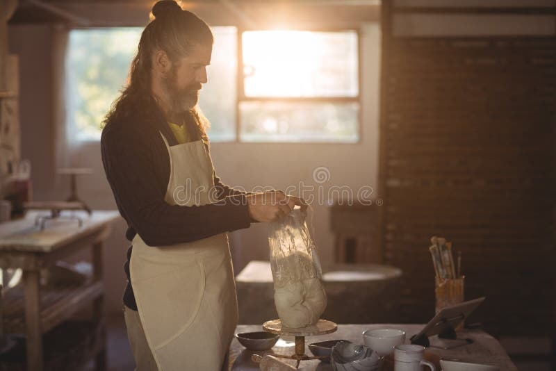 Male Potter Removing Plastic Cover Molding Clay Stock Photos Free