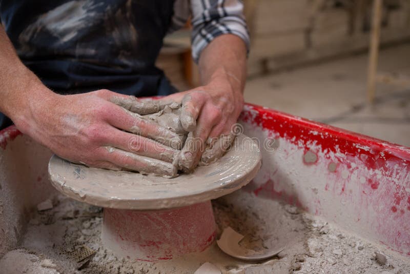 Male Potters Painting a Bowl in Pottery Stock Photo Image of