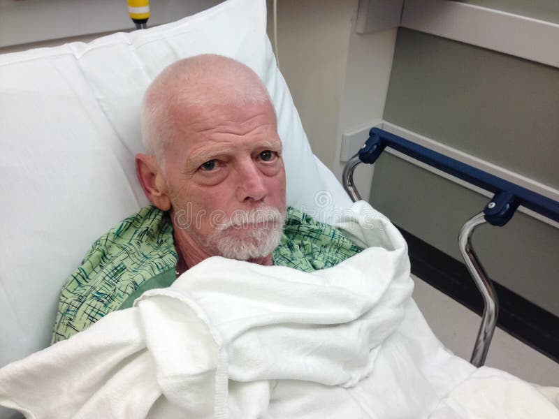 Male senior hospital patient in hospital bed royalty free stock photo Male senior hospital patient in hospital bed royalty free stock photo