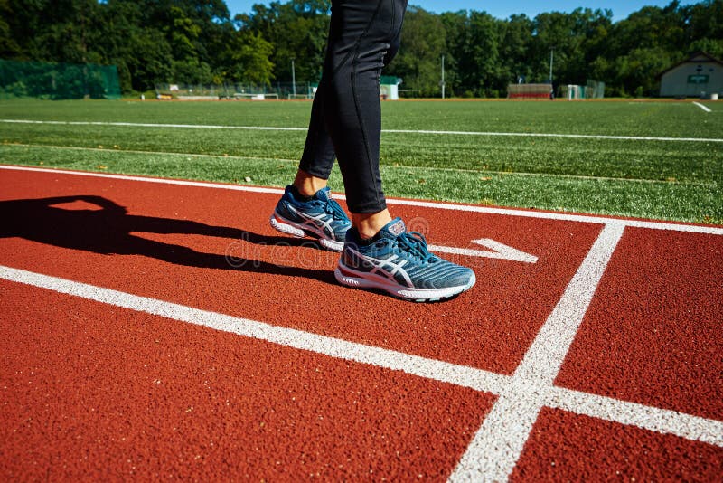 Male Sprinter Wearing Asics Gel Nimbus Training at Running Track Image - Image of healthy, brand: 257408519