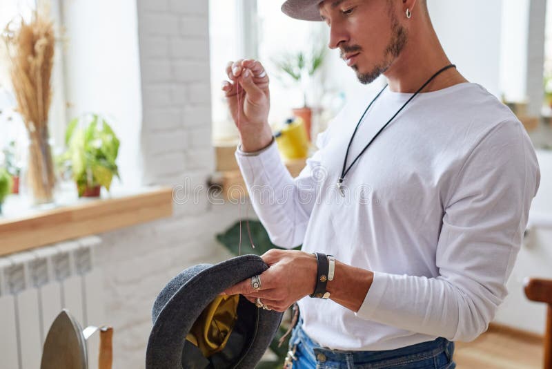 Male Tailor Sews a Hat, Use a Needle and Thread Stock Image Image of hats, handcraft 206590427