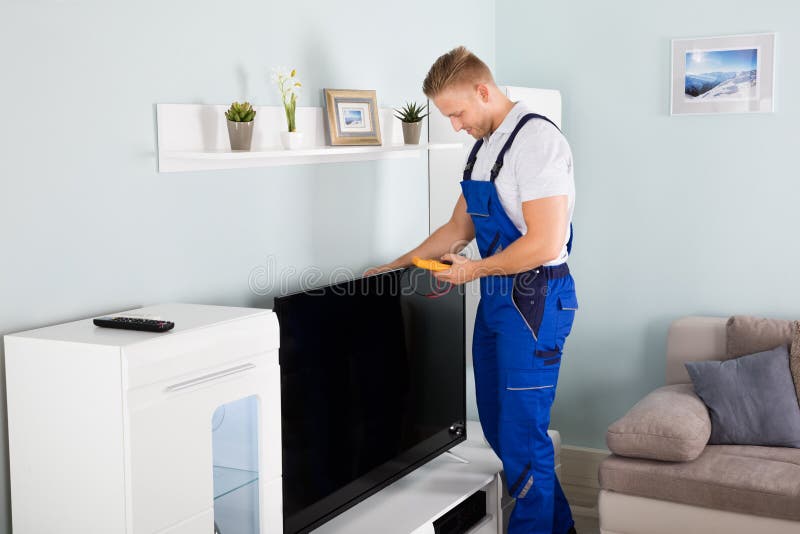 Technician Checking Television Stock Photo Image of apartment, repair
