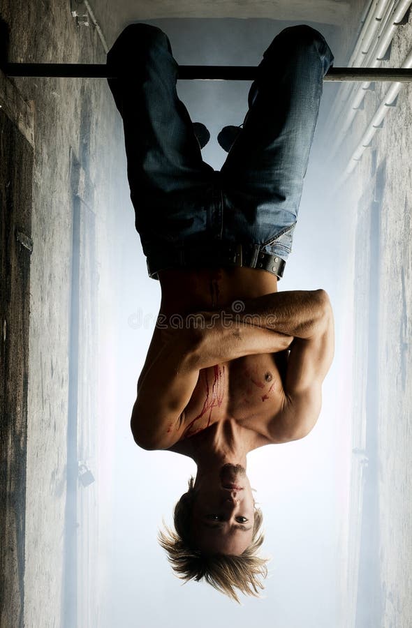 Male Vampire Hanging Upside Down.