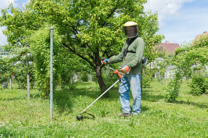 Worker Protective Clothing Cutting Grass Grass Cutter Stock Photos