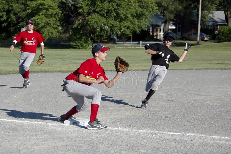 Male Youth Baseball Action editorial photography. Image of motion