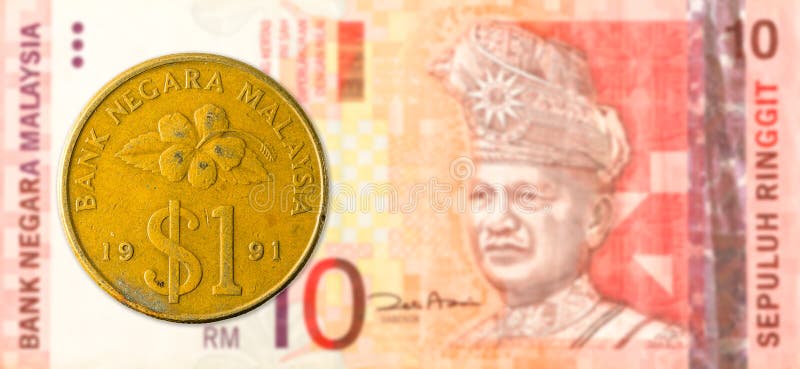 1 Maleis ringgit muntstuk tegen Maleis ringgit 10 bankbiljet royalty-vrije stock foto 1 Maleis ringgit muntstuk tegen Maleis ringgit 10 bankbiljet royalty-vrije stock foto